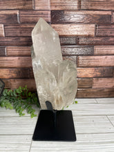 Load image into Gallery viewer, Clear Quartz With Chlorite Cluster/Point On Metal Stand