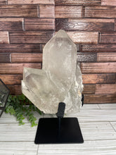 Load image into Gallery viewer, Clear Quartz With Chlorite Cluster/Point On Metal Stand