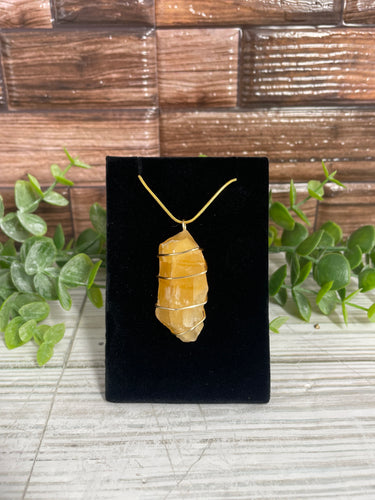 Orange Calcite Wire-Wrapped Pendant (Gold)