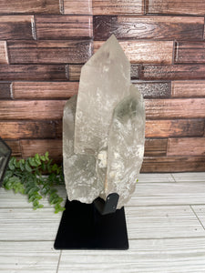 Clear Quartz With Chlorite Cluster/Point On Metal Stand